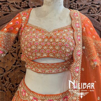 Rust Orange Silk Net Bridal Lehenga