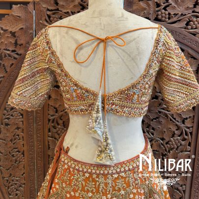 Rust Orange Net Bridal Lehenga