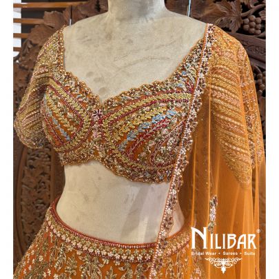 Rust Orange Net Bridal Lehenga