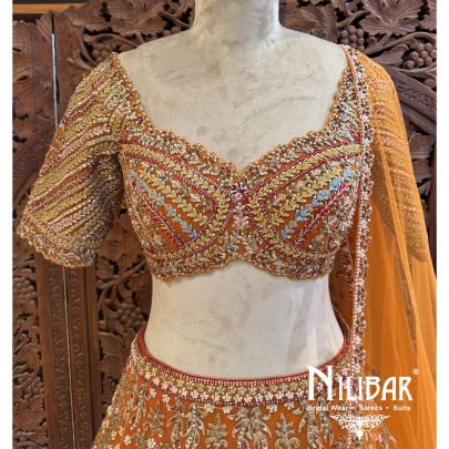 Rust Orange Net Bridal Lehenga