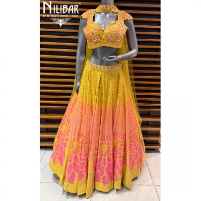 Yellow & Pink Georgette Crop Blouse Paired With Lehenga & Net Neck Dupatta