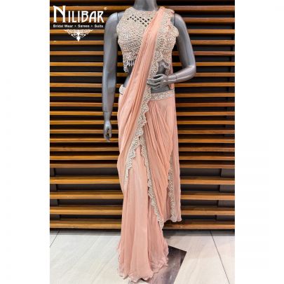 Peach Georgette Crop Blouse Paired With Pre Draped Saree