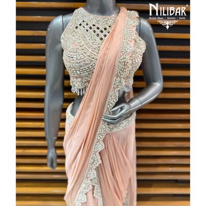 Peach Georgette Crop Blouse Paired With Pre Draped Saree