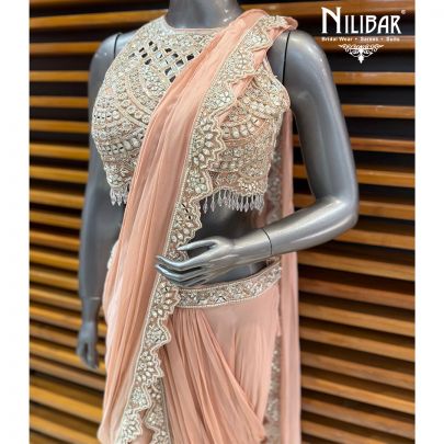 Peach Georgette Crop Blouse Paired With Pre Draped Saree