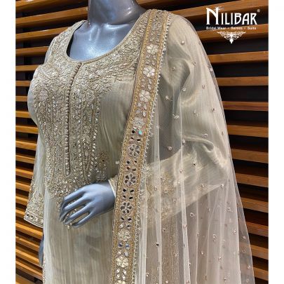 Ivory Gold Tissue Silk Suit Paired With Farshi Salwar & Net Dupatta
