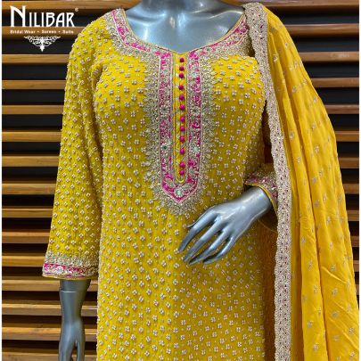 Yellow Georgette Garara Suit Paired With Organza Dupatta