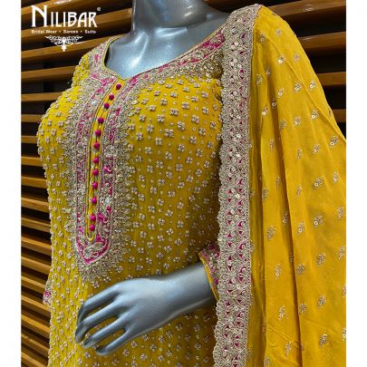 Yellow Georgette Garara Suit Paired With Organza Dupatta