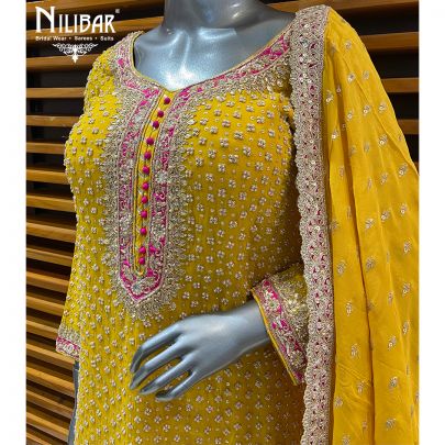Yellow Georgette Garara Suit Paired With Organza Dupatta
