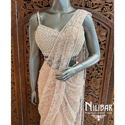 Light Peach Lycra Net Drape Saree