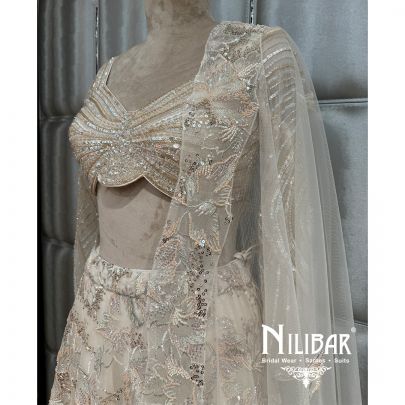 Ivory Net Embroidered Lehenga