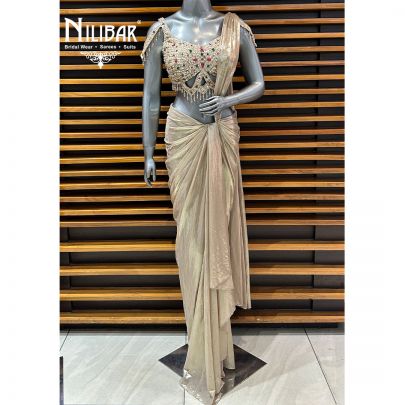 Gold Net Blouse Paired With Lycra Drape Saree