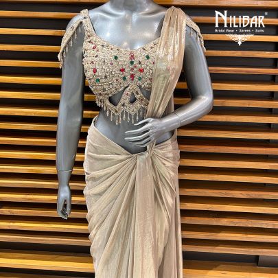 Gold Net Blouse Paired With Lycra Drape Saree