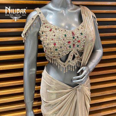Gold Net Blouse Paired With Lycra Drape Saree