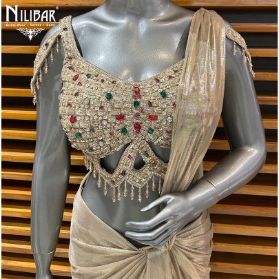 Gold Net Blouse Paired With Lycra Drape Saree