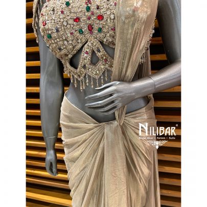 Gold Net Blouse Paired With Lycra Drape Saree