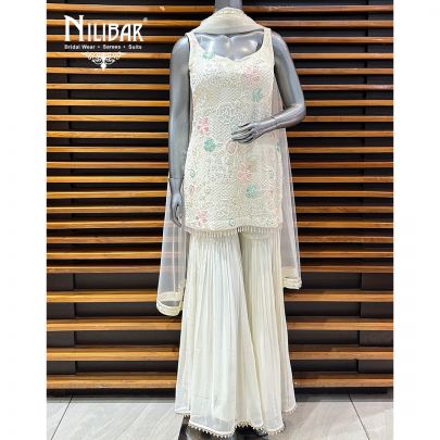 Off White Georgette Garara Suit Paired With Net Dupatta