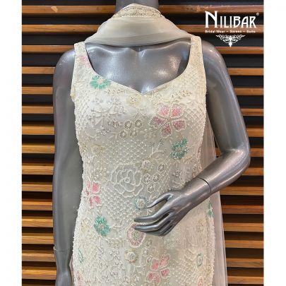 Off White Georgette Garara Suit Paired With Net Dupatta