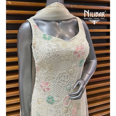 Off White Georgette Garara Suit Paired With Net Dupatta