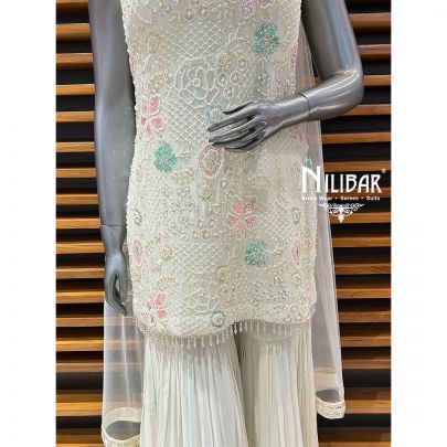 Off White Georgette Garara Suit Paired With Net Dupatta