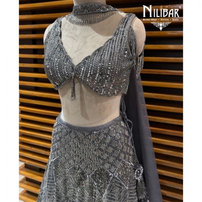 Grey & Silver Net Crop Choli Paired With Lehenga & Dupatta