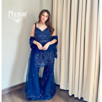 Shikha Khurrana In Our Royal Blue Net Peplum Shirt Paired With Bell-Bottom