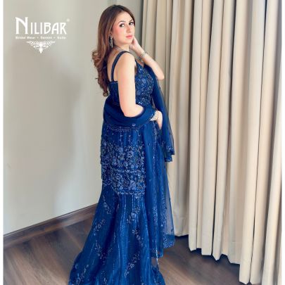 Shikha Khurrana In Our Royal Blue Net Peplum Shirt Paired With Bell-Bottom