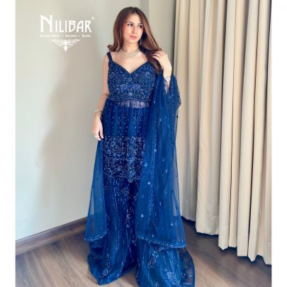 Shikha Khurrana In Our Royal Blue Net Peplum Shirt Paired With Bell-Bottom