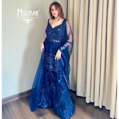 Shikha Khurrana In Our Royal Blue Net Peplum Shirt Paired With Bell-Bottom