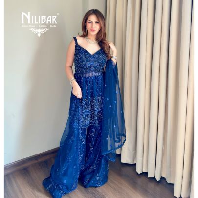 Shikha Khurrana In Our Royal Blue Net Peplum Shirt Paired With Bell-Bottom