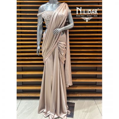 Beige Gold Net Blouse Paired With Satin Drape Saree