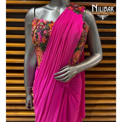 Hot Pink Silk Corset Blouse Paired With Lycra Drape Saree