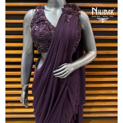 Dark Purple Net Embellished Blouse Paired With Lycra Drape Saree