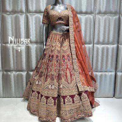 Rust and mehroon Net Bridal Lehenga