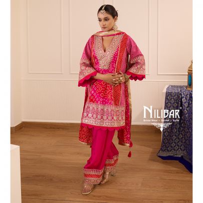 Hot Pink Bandhani Crepe Shirt Paired With Straight Crepe Salwar & Shiffon Dupatta