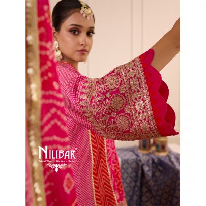 Hot Pink Bandhani Crepe Shirt Paired With Straight Crepe Salwar & Shiffon Dupatta