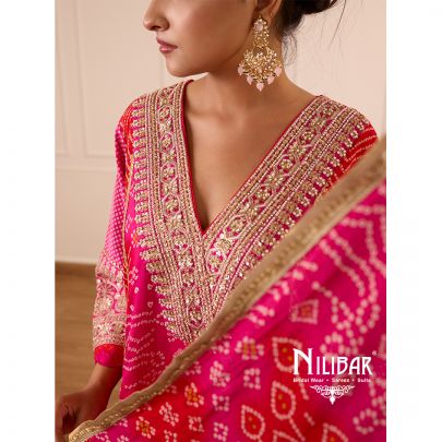 Hot Pink Bandhani Crepe Shirt Paired With Straight Crepe Salwar & Shiffon Dupatta