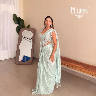 Gurman Dahelay In Our Powder Blue Shimmer Net Drape Saree