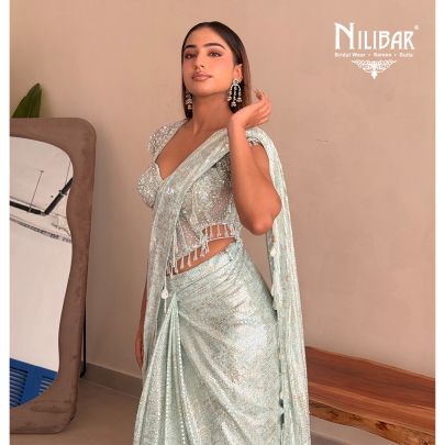 Gurman Dahelay In Our Powder Blue Shimmer Net Drape Saree