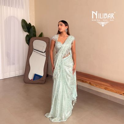 Gurman Dahelay In Our Powder Blue Shimmer Net Drape Saree