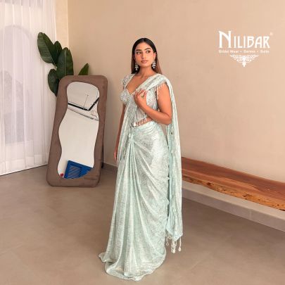 Gurman Dahelay In Our Powder Blue Shimmer Net Drape Saree