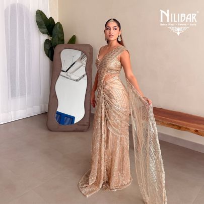 Prabhleen Dahelay In Our Beige Gold Net Drape Saree