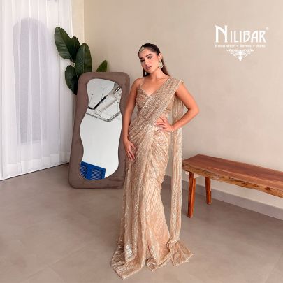 Prabhleen Dahelay In Our Beige Gold Net Drape Saree