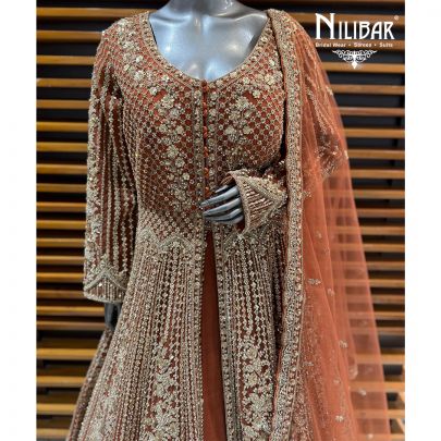 Rust Net Embroidered Long Jacket Paired With Lehenga & Net Dupatta