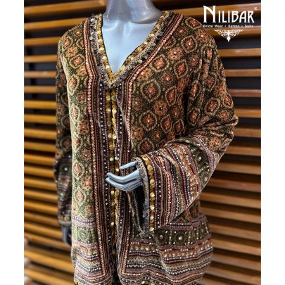 Mehendi Green Velvet Mid Length Top Paired With Dhoti Pants