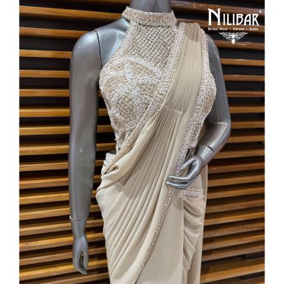 Ivory Georgette Crop Top Paired With Pleated Draped Saree