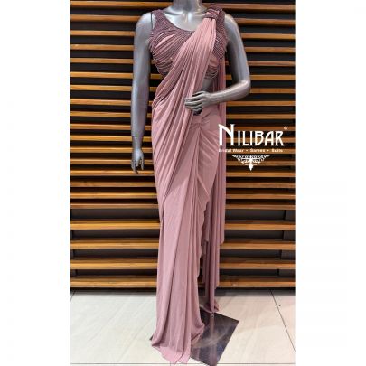 Mauve Net Choli Paired With Lycra Drape Saree