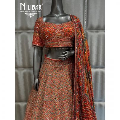 Rust Silk Beautifully Embellished Print Lehenga