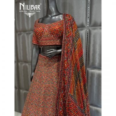 Rust Silk Beautifully Embellished Print Lehenga