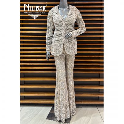 Beige Net Heavy Embroidered Top Paired With Pants