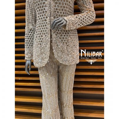 Beige Net Heavy Embroidered Top Paired With Pants